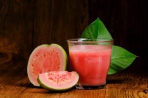 red-guava-juice-is-served-wooden-background-with-guava-fruit-slices-leaf-decorations_448865-1573-300x200 6 Benefits of watermelon juice